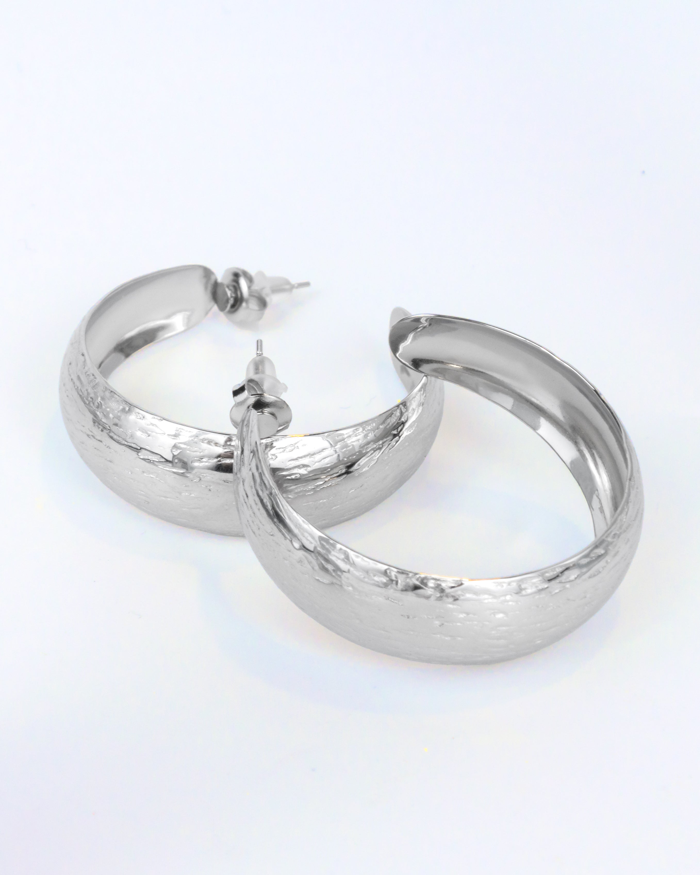 Carved hoop earrings