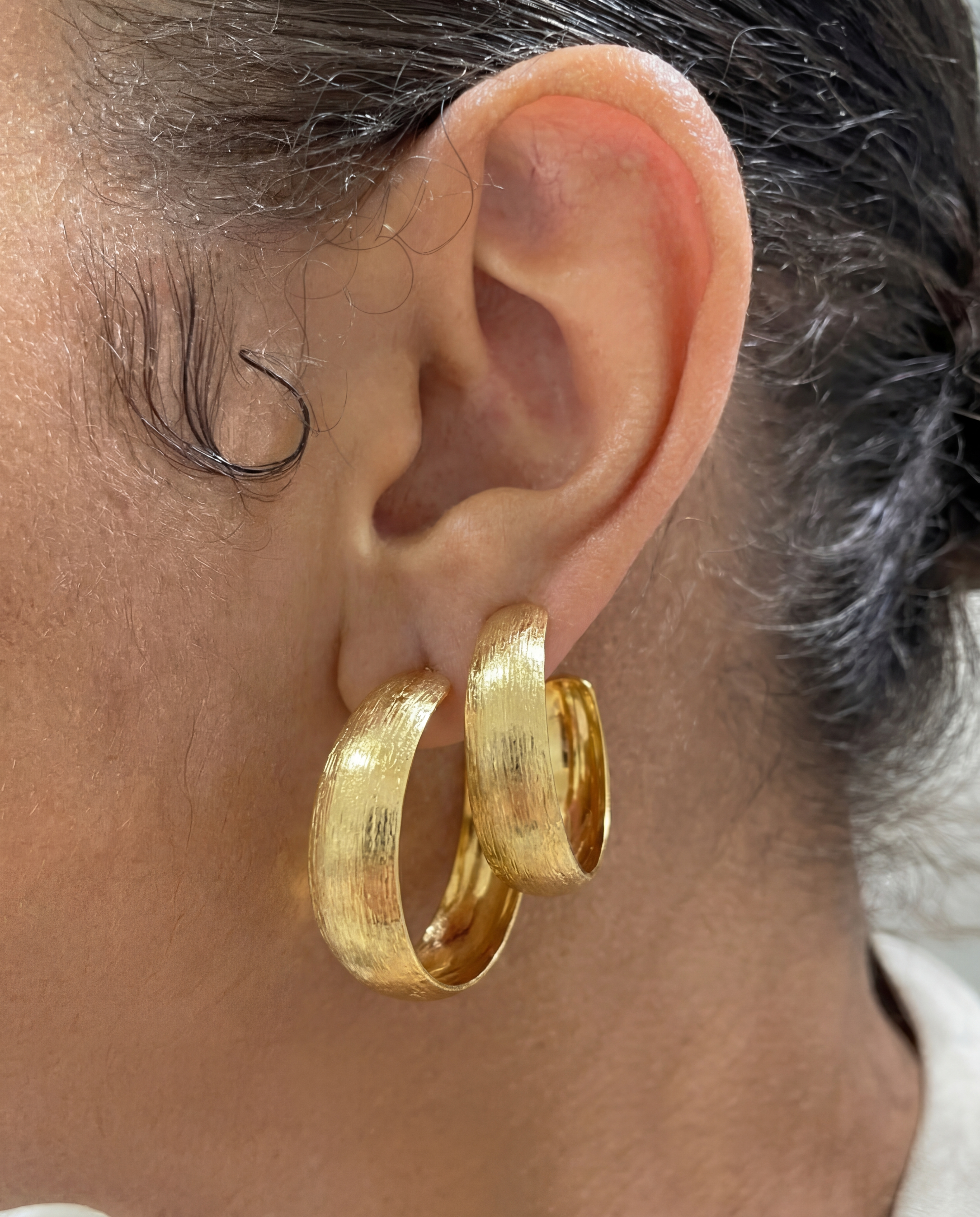 Carved hoop earrings