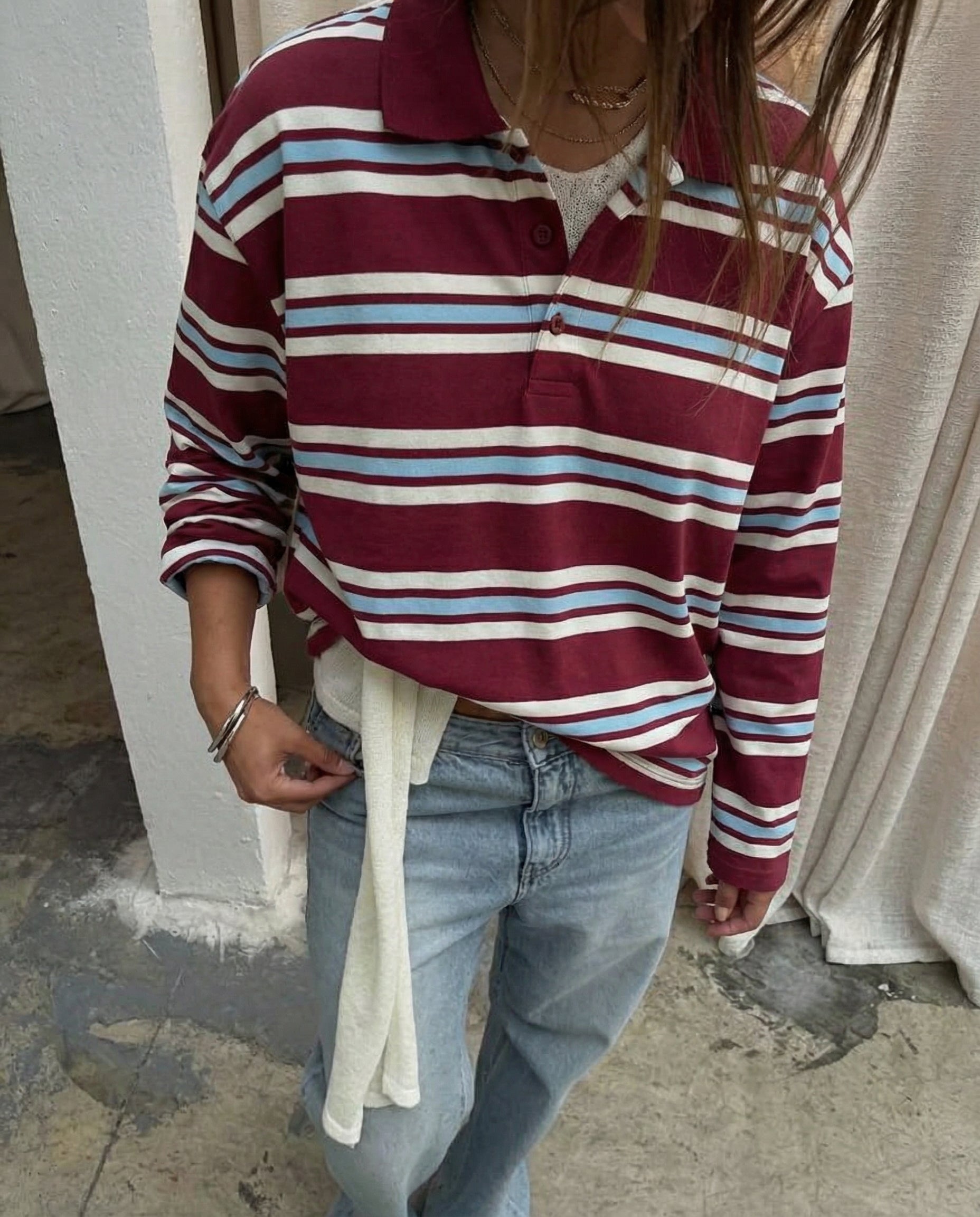 Gestreepte polo met lange mouwen